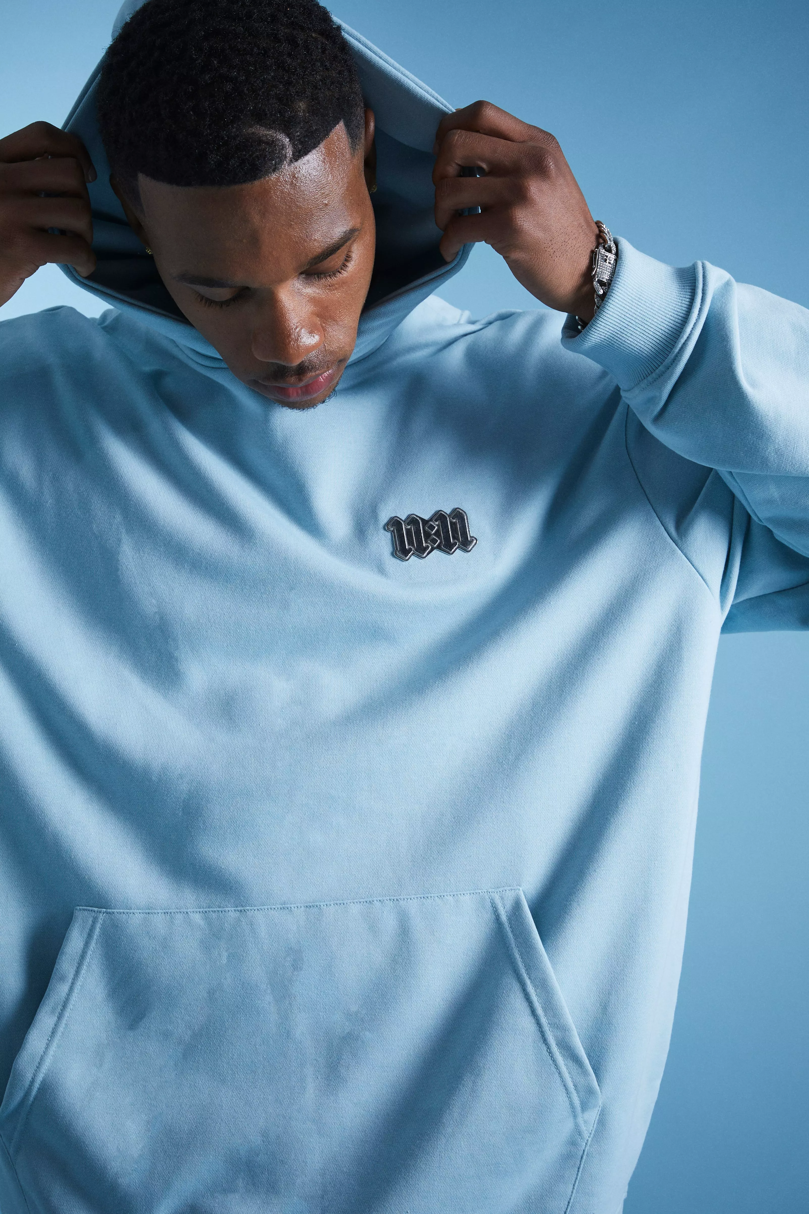 Lil Tjay Oversized Loopback Metal Badge Hoodie | boohooMAN USA